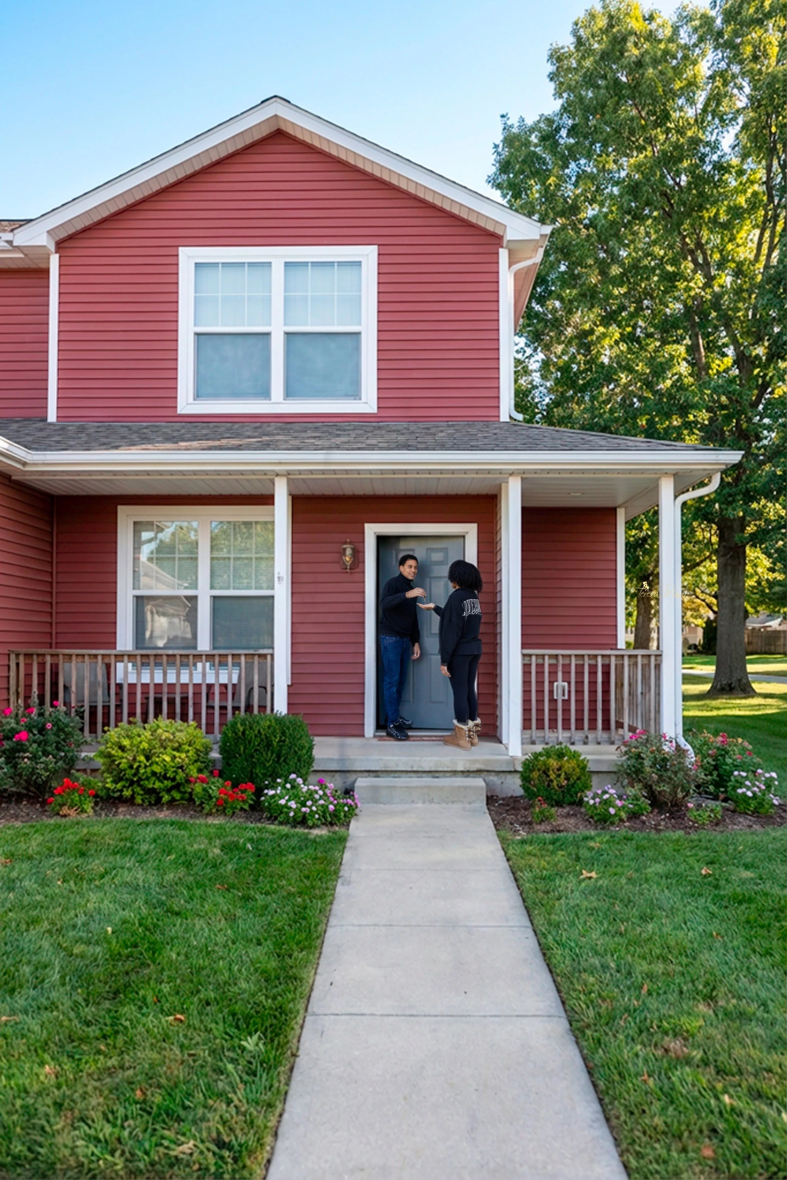 Residents at the front door of a Campbell East managed home